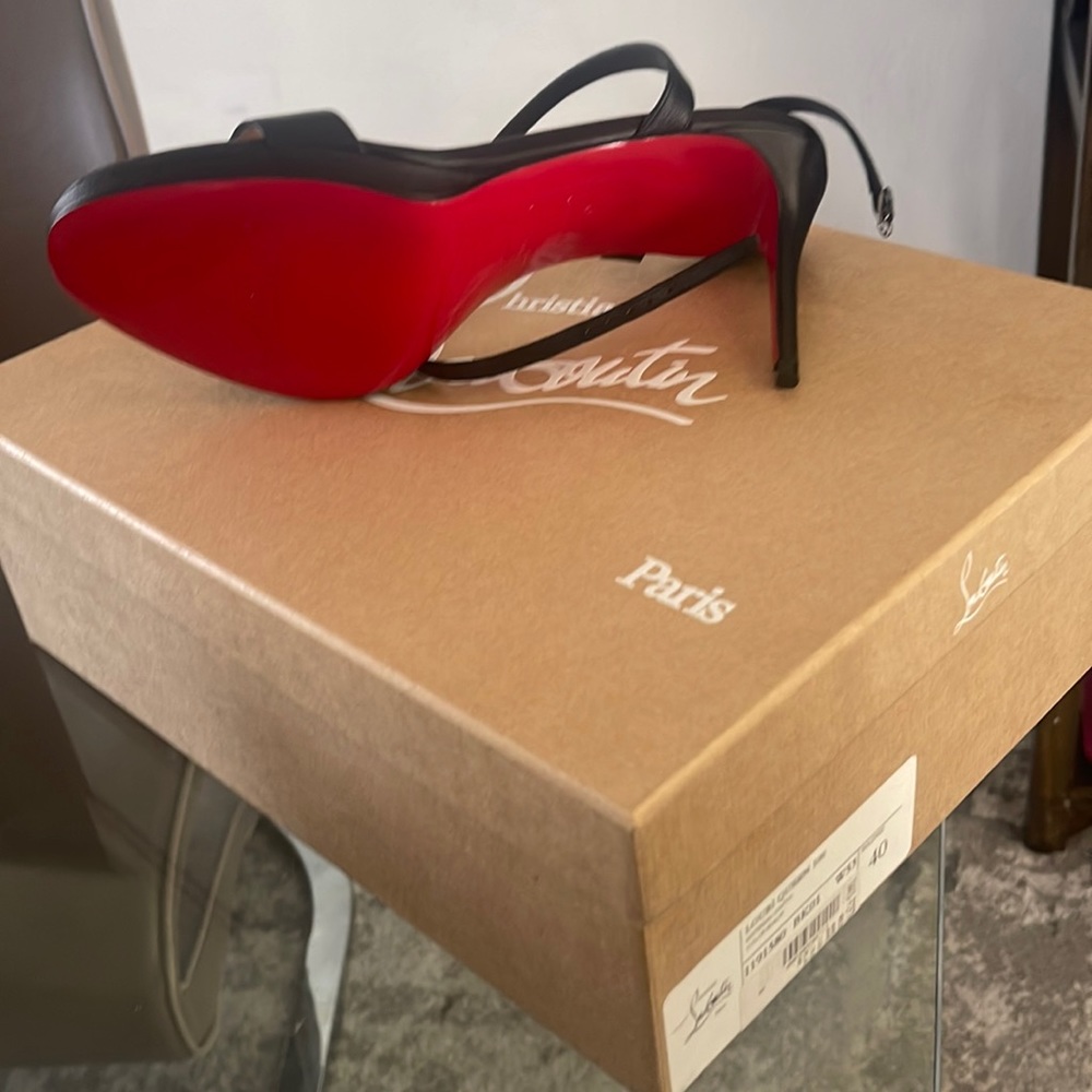 Christina Louboutin size 40 has never been brand new in its original form